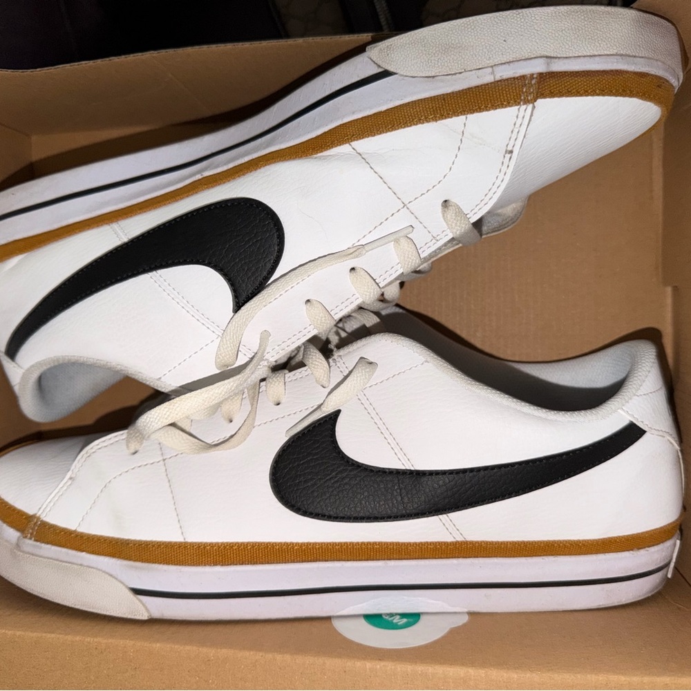 Nike White Sneakers with Black Swoosh and Tan Stripe